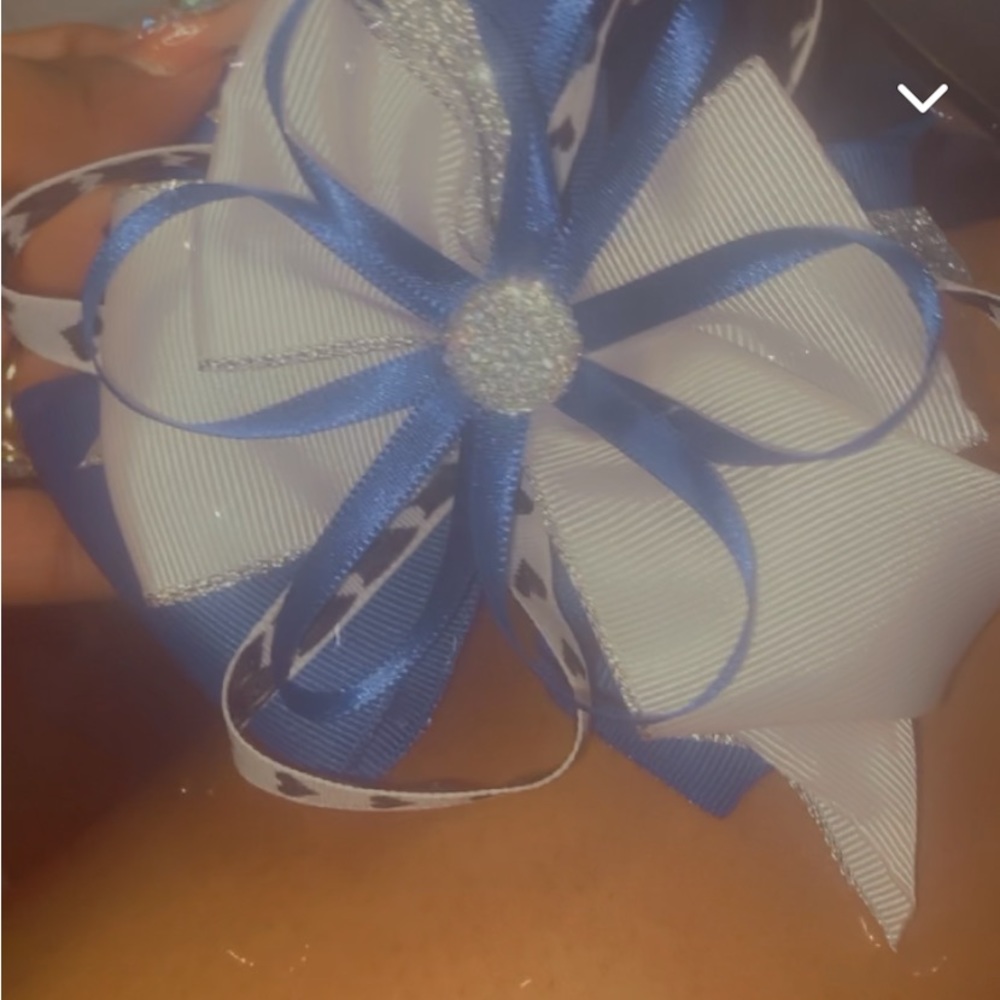 handmade royal blue boutique bow with diamond distilled sparkles..
